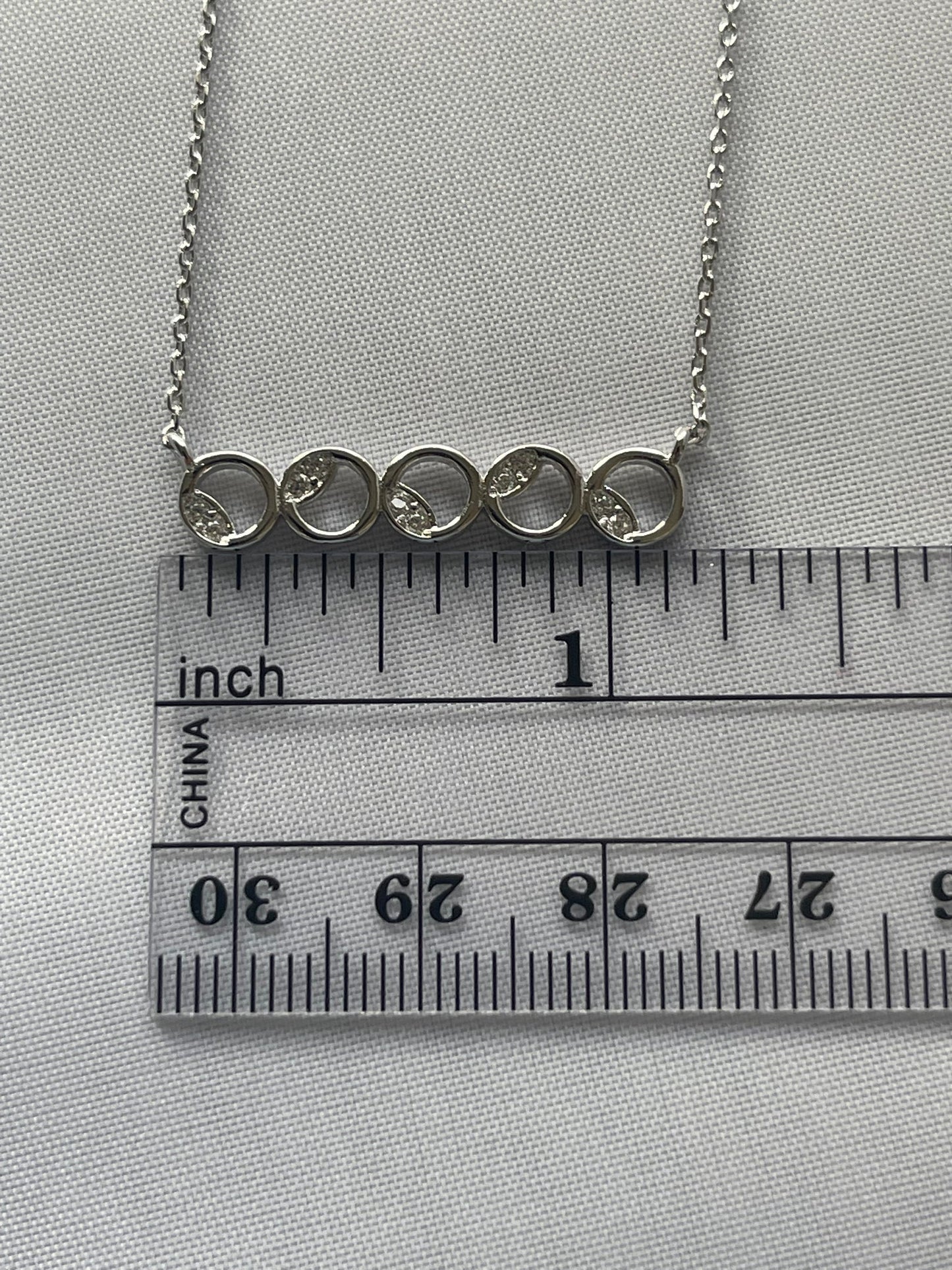 Rhodium Electroplated Circle Theme Necklace