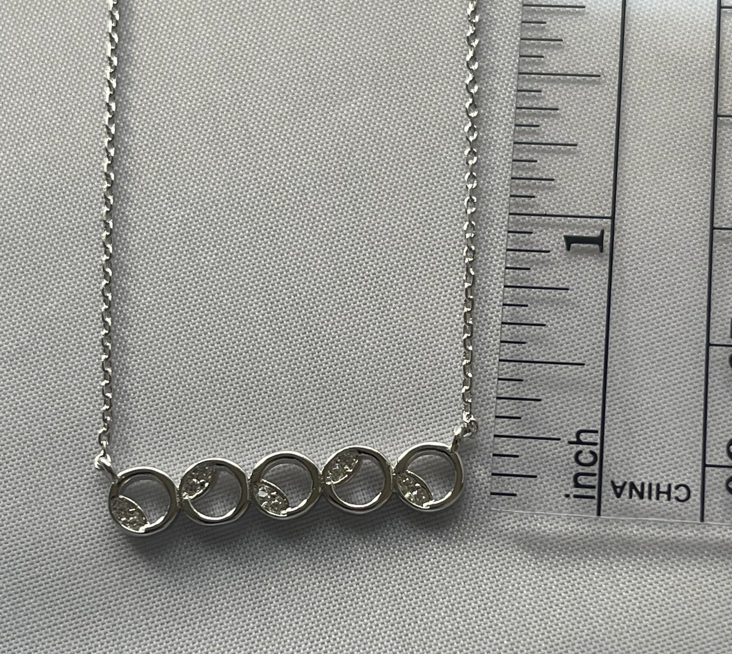 Rhodium Electroplated Circle Theme Necklace